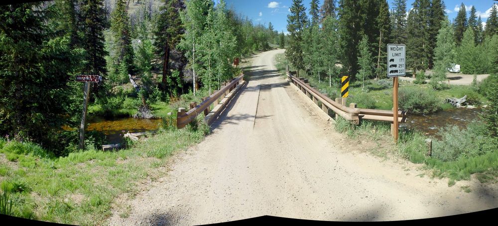 GDMBR: The sign states Warm Springs Creek and we will turn left here to set up camp for the night.